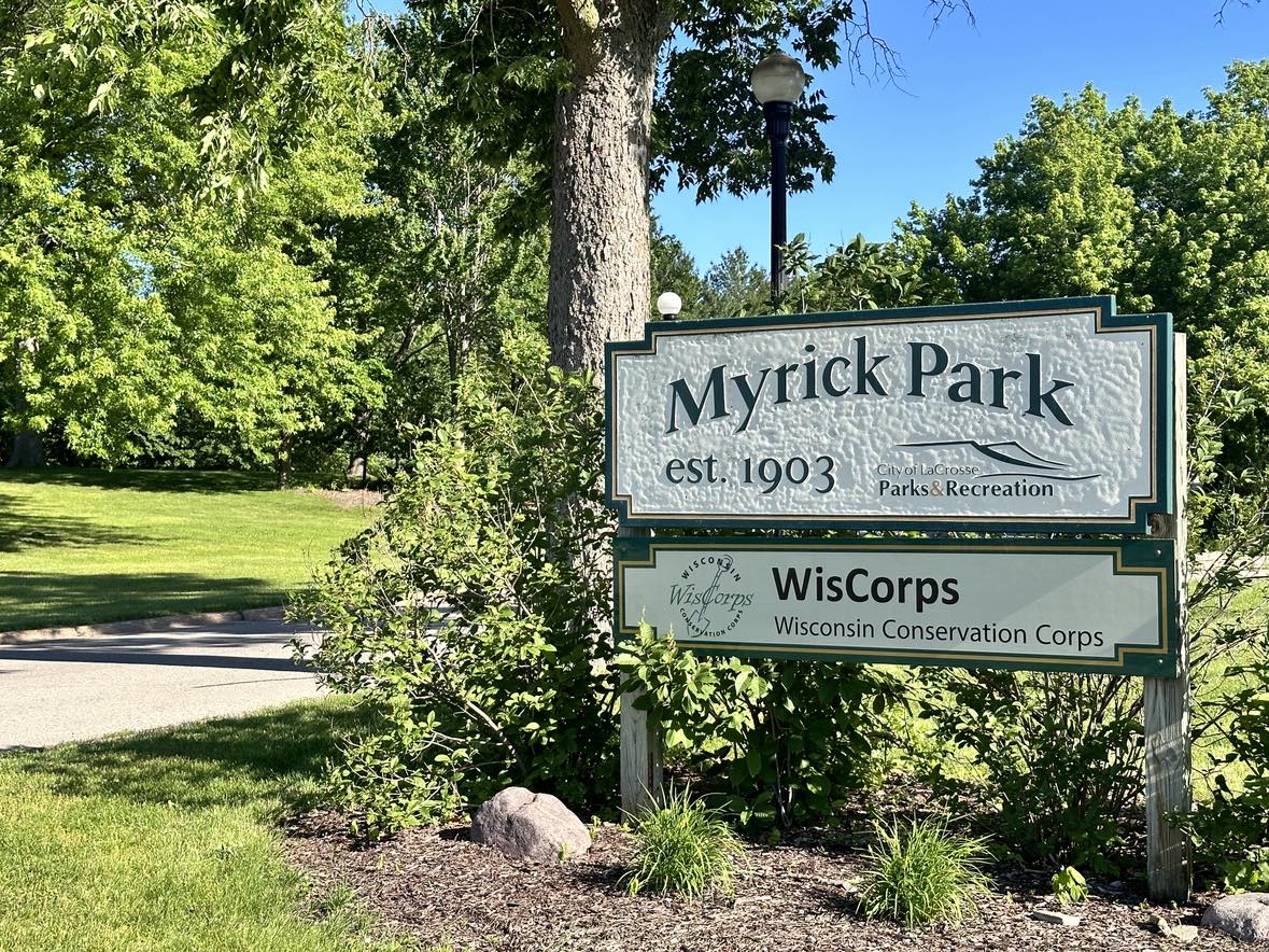 Sign to entrance of a park area that reads 