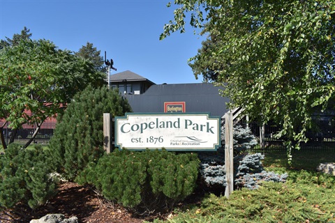 Sign for Copeland Park, established in 1876, with 