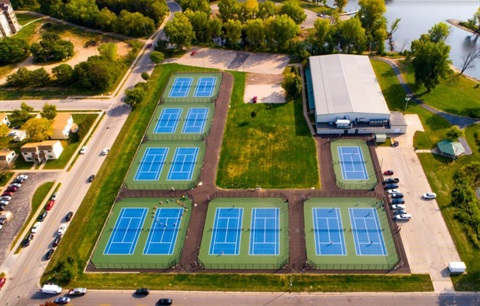 aerial view of 13 tennis and pickleball courts at Green Island park 
