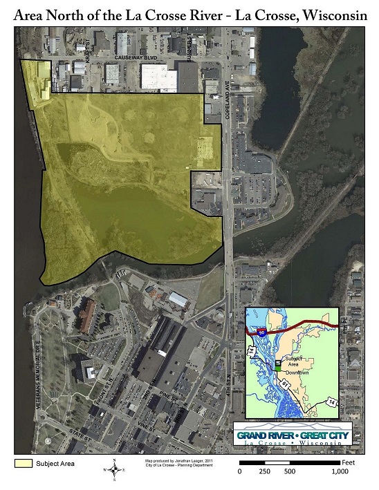 Aerial map of the area north of the La Crosse River in La Crosse, Wisconsin, highlighting a subject area in yellow. Includes inset map of the region and a scale bar.