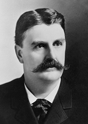 Black and white photo of a man from 1890