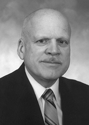 Black and white photo of a man from 1988